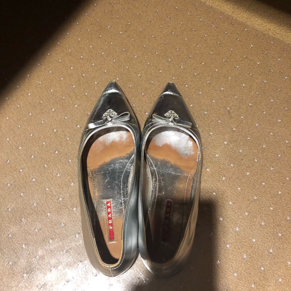 Silver Prada pointy toe flats